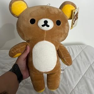 Rilakkuma plush with zipper pocket in back